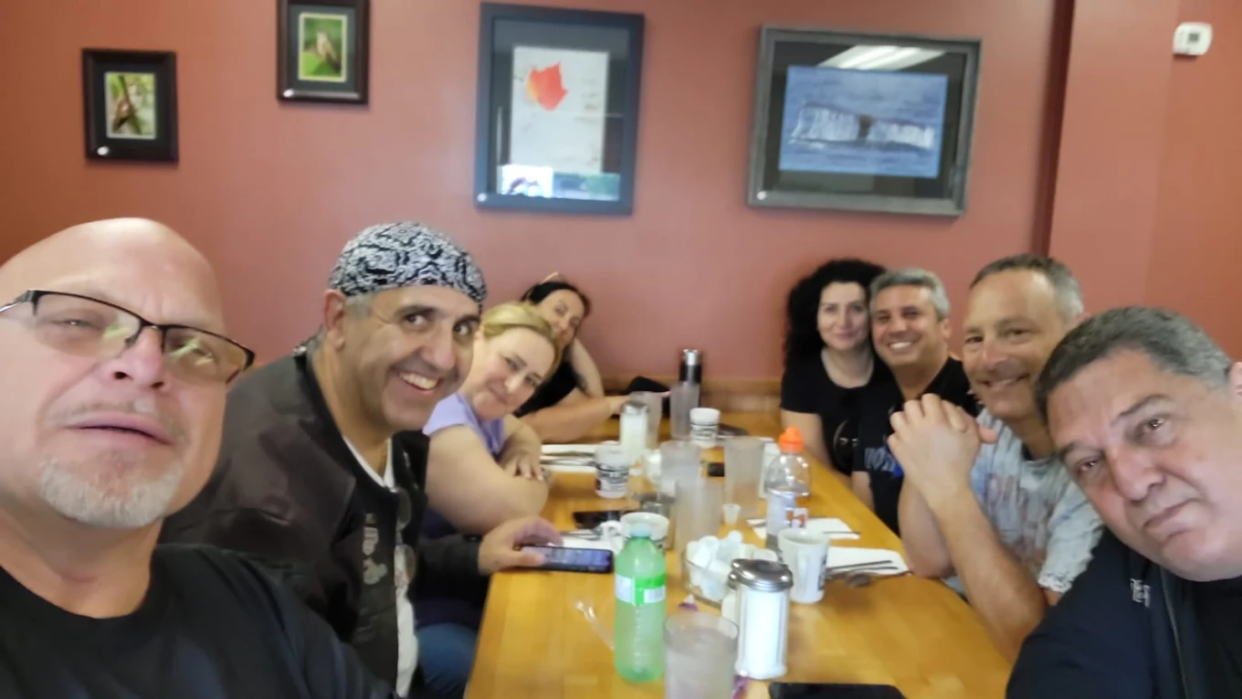 Group of diners enjoying a meal together
